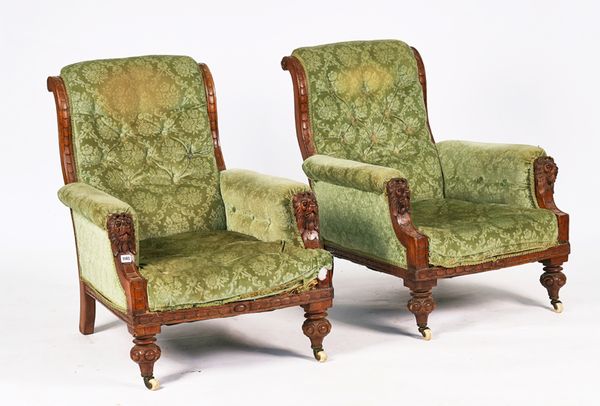 A PAIR OF VICTORIAN OAK EASY ARMCHAIRS