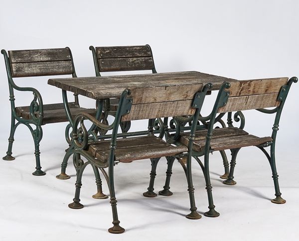 A SUITE OF GREEN PAINTED CAST IRON GARDEN FURNITURE TO COMPRISE