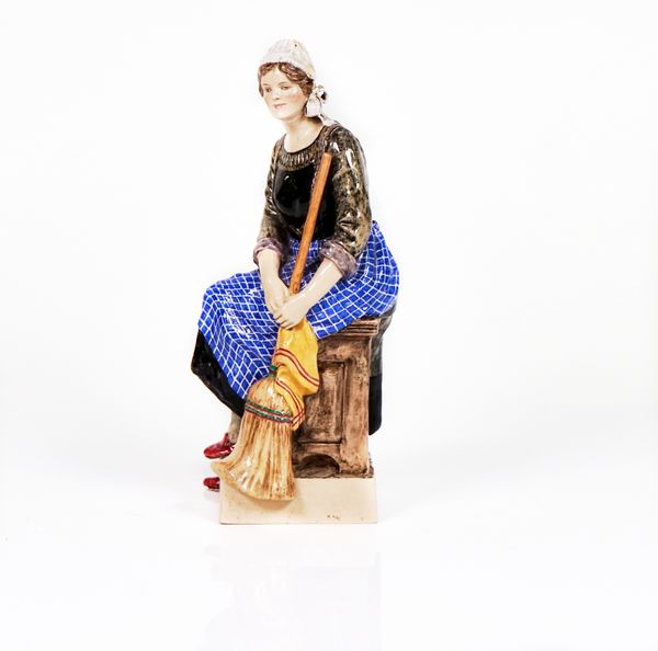 A Dulwich pottery figure of a peasant woman