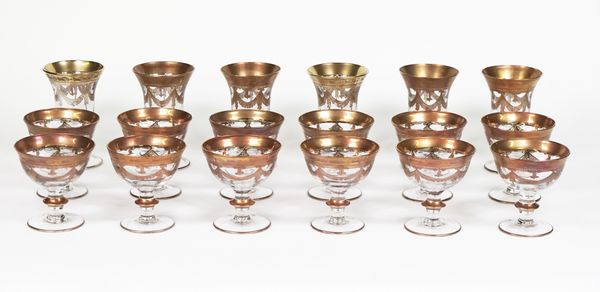 A part suite of gilt decorated drinking glasses