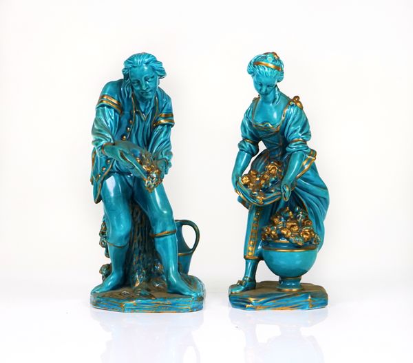 A PAIR OF SEVRES STYLE TURQUOISE AND GILT FIGURES OF GARDENERS