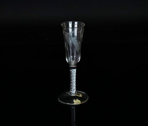 An engraved opaque twist wine glass
