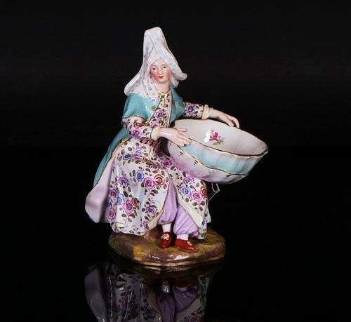 A MEISSEN SWEETMEAT FIGURE