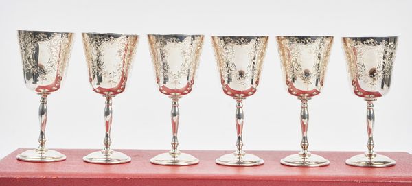 Six similar silver wine goblets