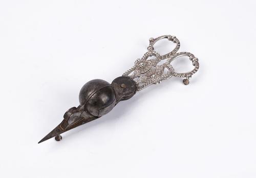 A pair of silver mounted steel candle snuffers