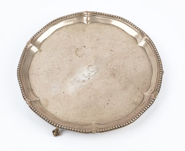 A George III silver shaped circular waiter