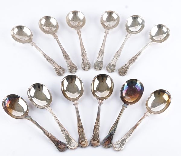 Six silver King's pattern soup spoons and six King's pattern plated spoons (12)