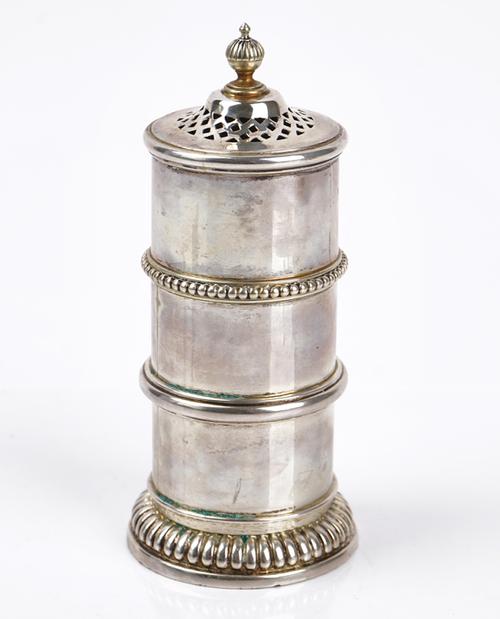 A silver sugar caster