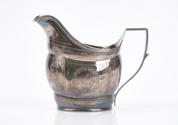 A George III silver milk jug