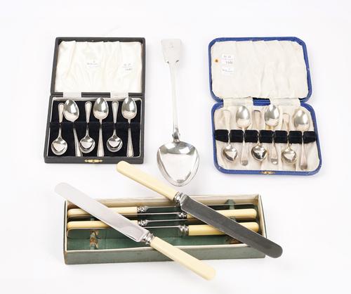 Two sets of six silver coffee spoons and two further items (4)