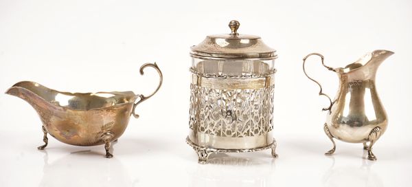 A silver sauceboat and two further items (3)