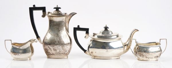 A silver four piece tea set