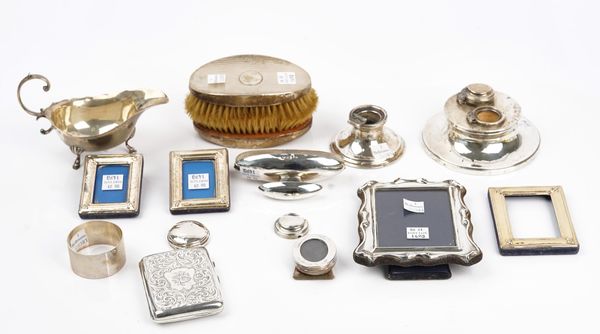 A silver sauceboat and further silver mounted items (12)