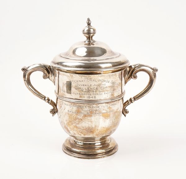 WITHDRAWN A silver large twin handled trophy cup and cover