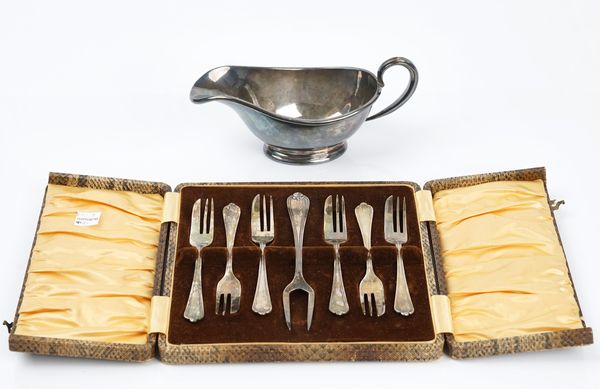 A set of six silver pastry forks and a serving fork (2)