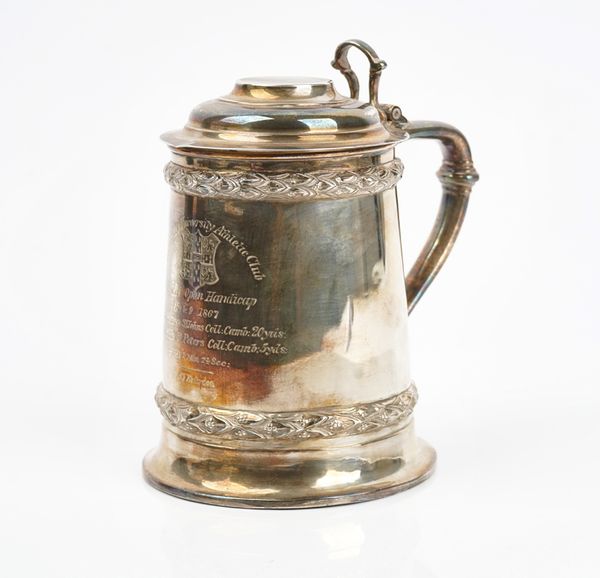 A Victorian silver hinge lidded tankard