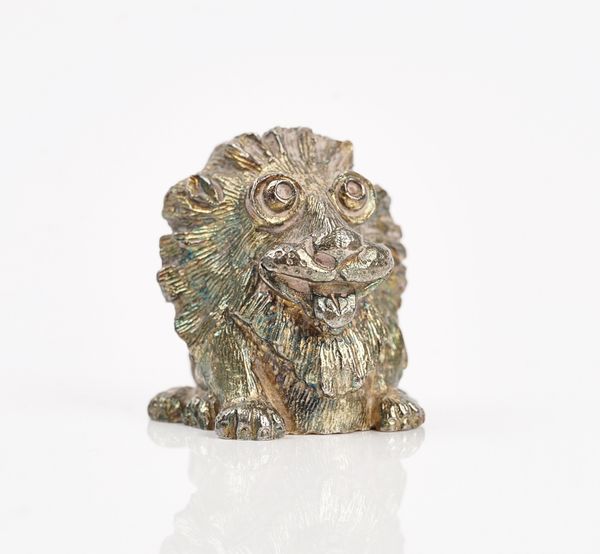 WITHDRAWN A Stuart Devlin silver paperweight, modelled as Leo the Lion