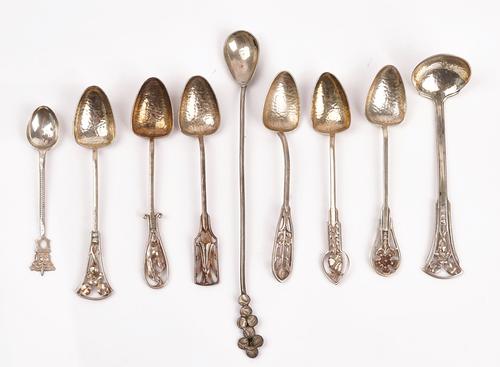 A group of foreign flatware (9)