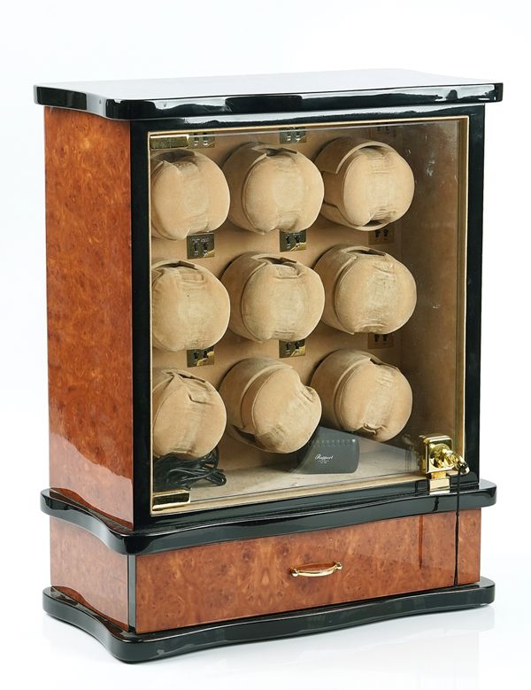 A Rapport nine watch winder with a lower drawer