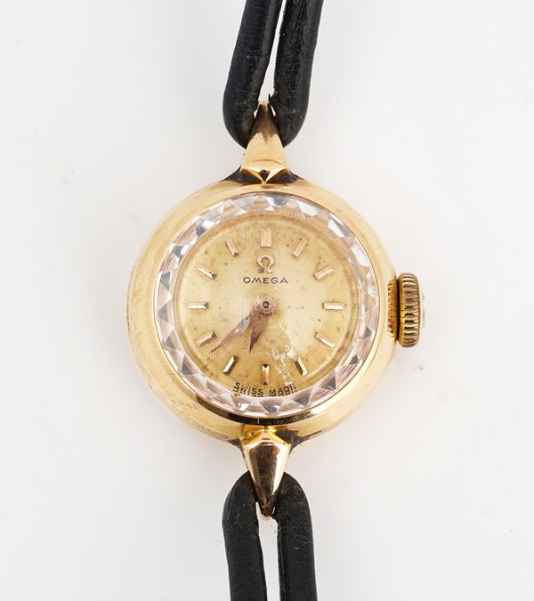 An Omega 18ct gold circular cased lady's wristwatch