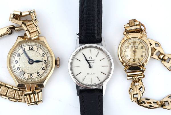 A lady's steel Omega De Ville Quartz wristwatch and two 9ct gold cased lady's wristwatches