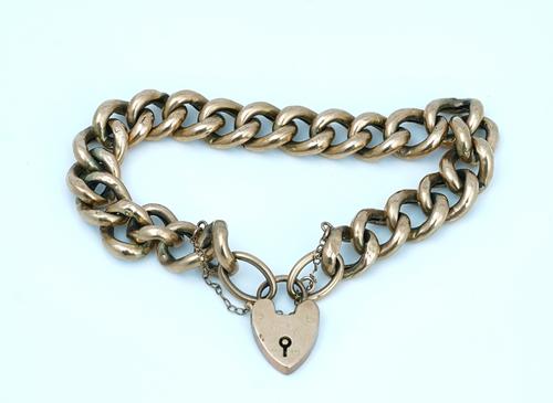 A gold curb link bracelet