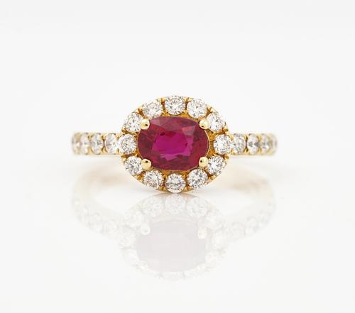 An 18ct yellow gold, ruby and diamond set cluster ring