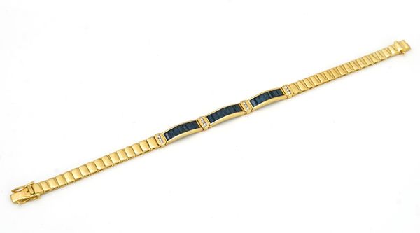 A gold, sapphire and diamond collar necklace and a matching bracelet (2)
