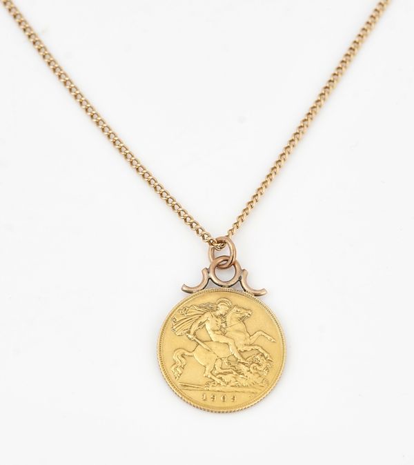A half sovereign pendant with a gold neckchain (2)