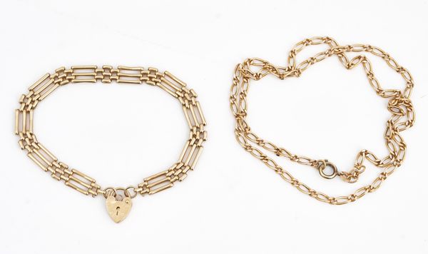 A gold neckchain and a gold bracelet