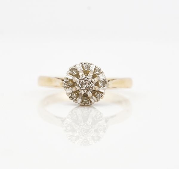 An 18ct gold and diamond nine stone cluster ring