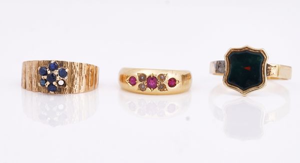 A Victorian 18ct gold, ruby and half pearl ring and two further rings (3)