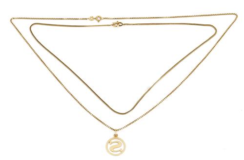 Two gold neckchains and a gold pendant