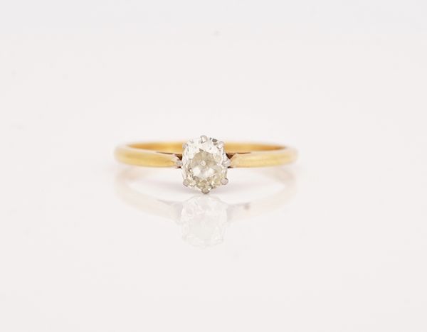 A gold and platinum, diamond single stone ring