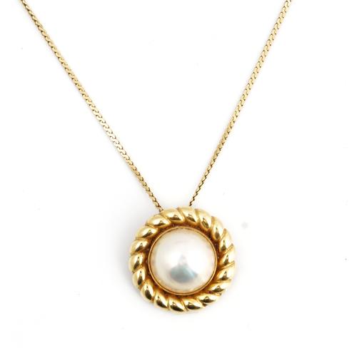 A gold and mabe pearl pendant with a gold neckchain