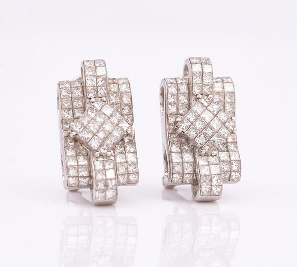 A pair of white gold and diamond earclips