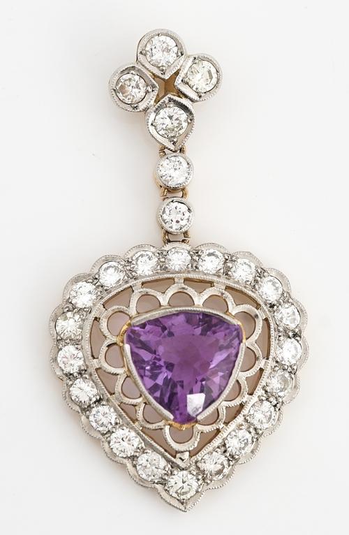 A gold, amethyst and diamond pendant
