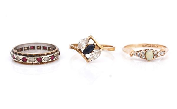 A gold, opal and diamond set ring and two further rings (3)