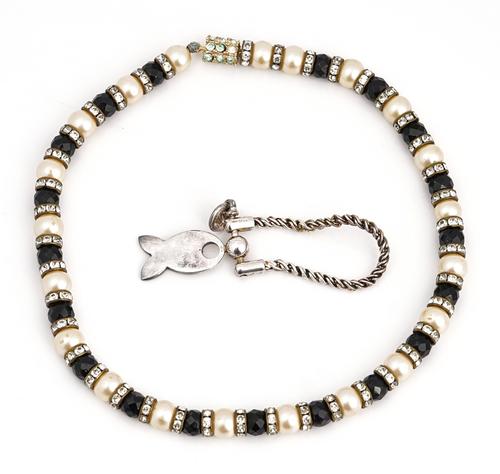 Tiffany; a silver keyring in the form of a fish and a costume necklace (2)