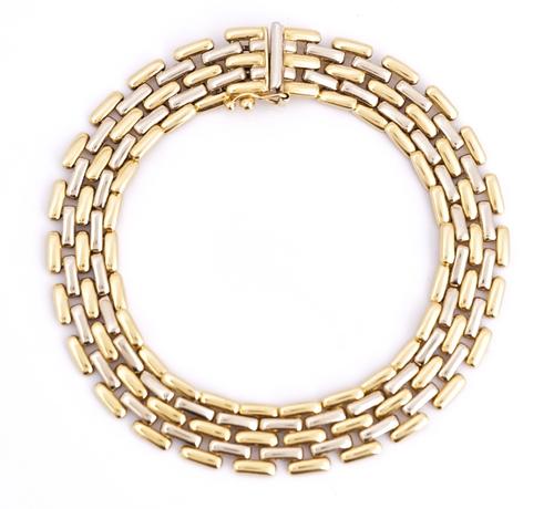 An 18ct two colour gold bracelet