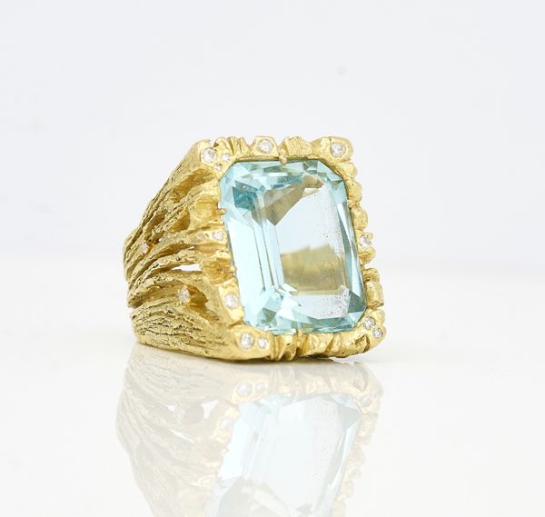 A gold, aquamarine and diamond set ring by Anton Fruhauf