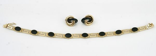A gold and black onyx bracelet and a pair of gold and black onyx earrings (2)