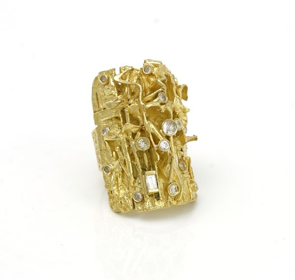 A gold and diamond ring by Anton Fruhauf
