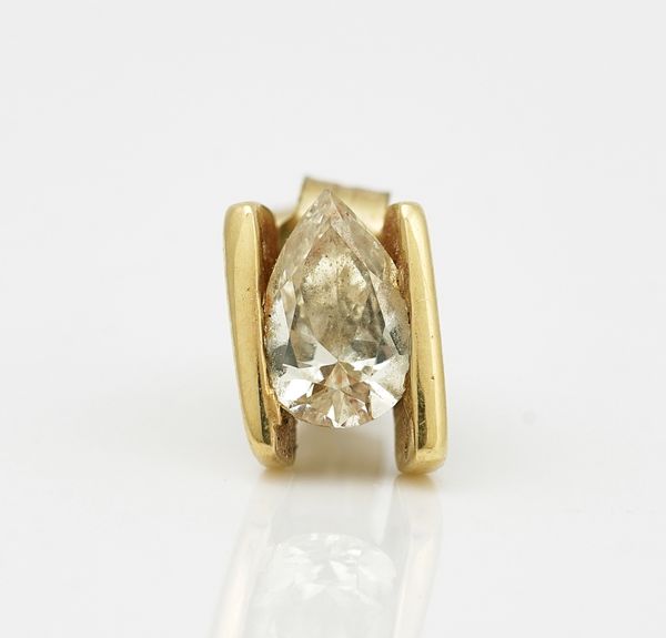 An 18ct gold earstud, mounted with a pear shaped diamond