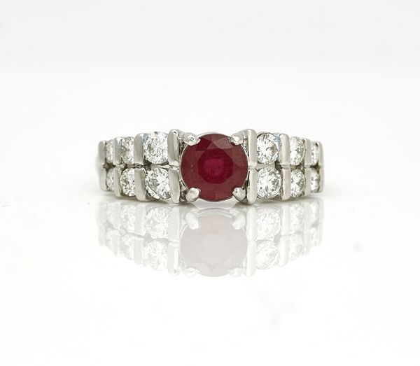 An 18ct white gold, ruby and diamond set ring