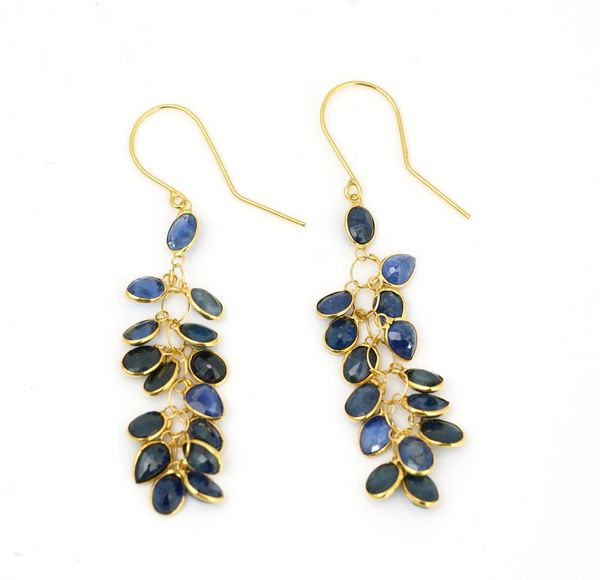 A pair of gold and sapphire pendant earrings