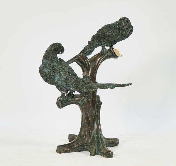 A BRONZE MODEL OF TWO PERCHING PARROTS