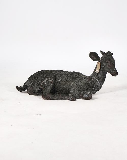 A BRONZE MODEL OF A RECUMBENT DEER