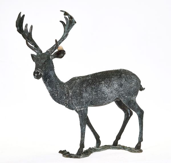 A BRONZE MODEL OF A STANDING STAG