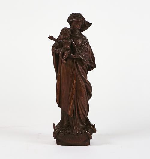 A CARVED LIMEWOOD FIGURE OF THE VIRGIN IMMACULATE